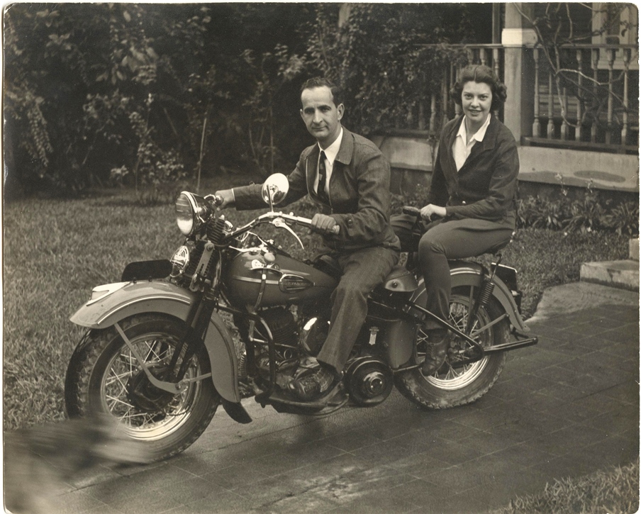 Henrietta Don Pepe on Motorcycle
